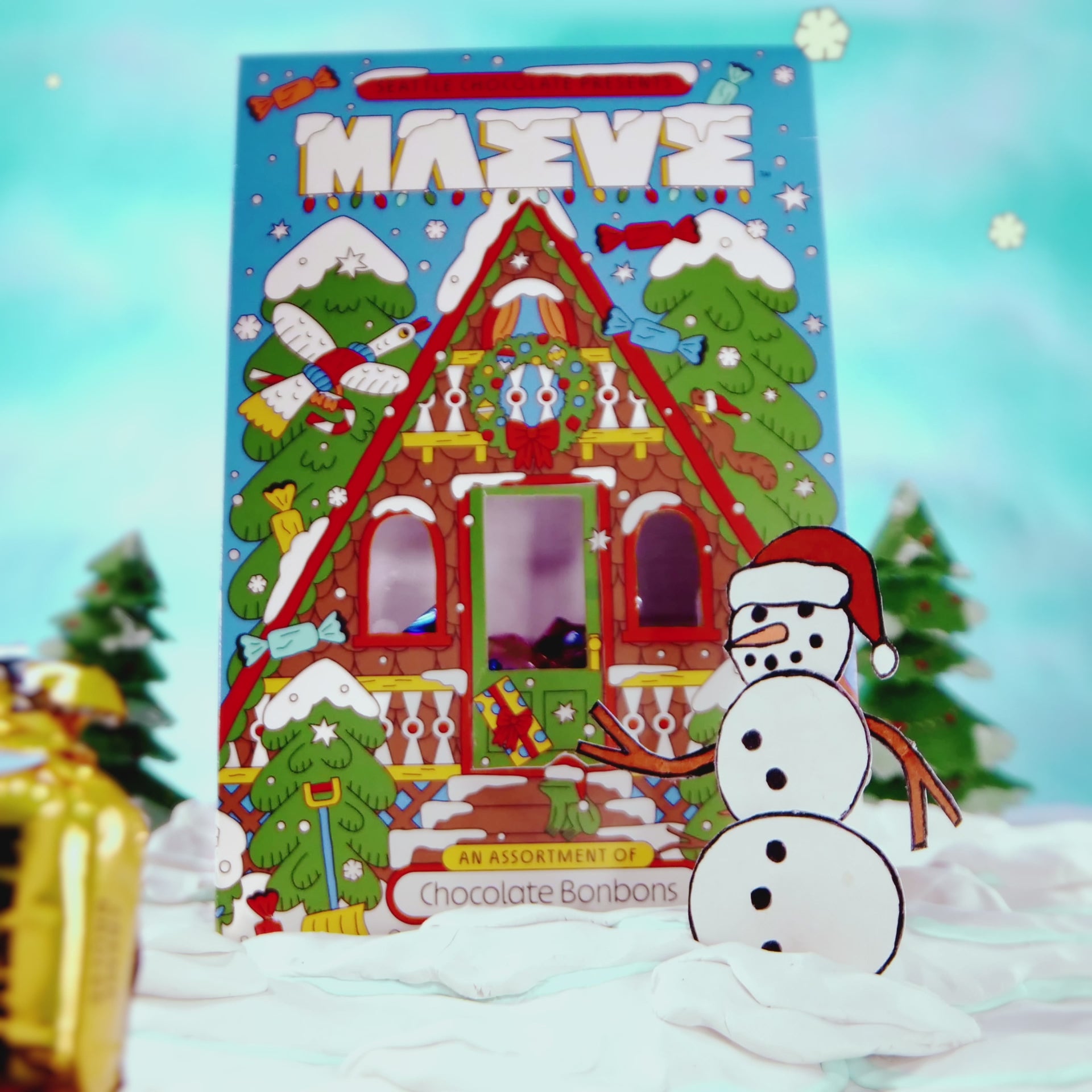 video of snowman cutout and maeve chocolate bon bons holiday a-frame packaging
